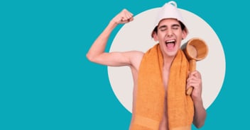 Man in towel, flexing muscles