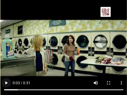 Still from Cheetos 2008 “Laundromat” ad showing prank with orange dust on white laundry, part of the Orange Underground campaign.