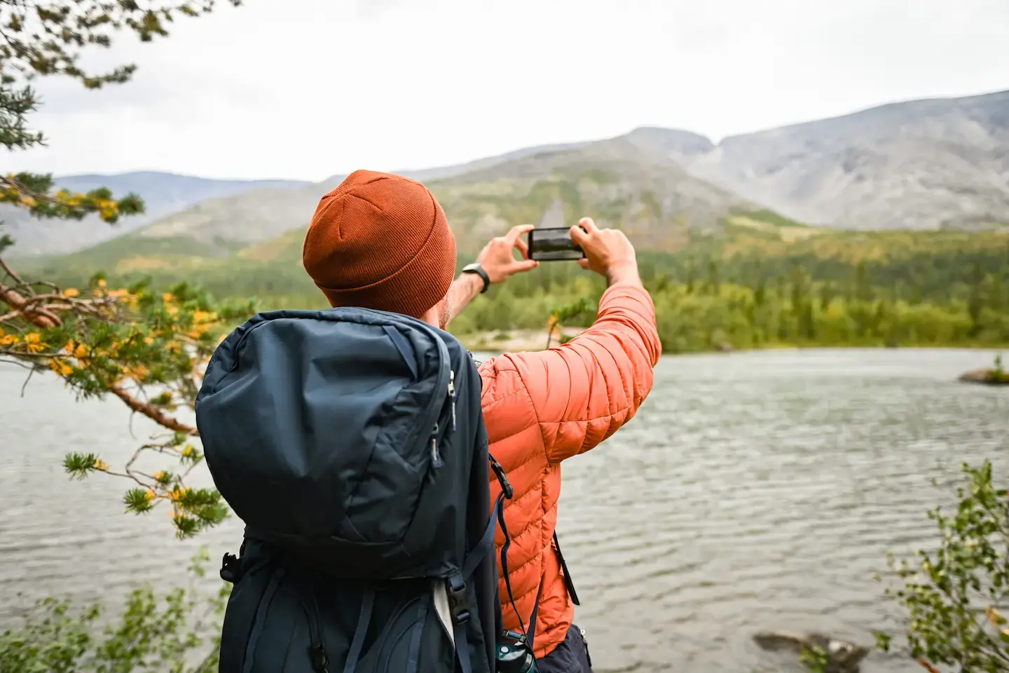 man taking photo on phone