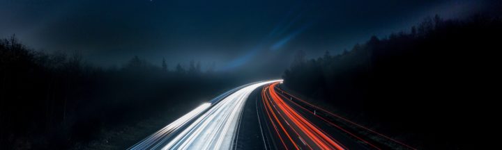 cars on highway at night